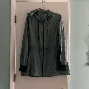 Workout or running jacket. Cinch waist, hood, and hand covers